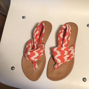 Orange and white fabric sandals